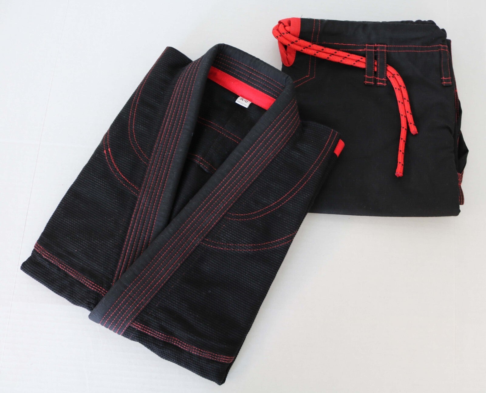 Gi de Jiu Jitsu Brasileño Premium Negro/Rojo 