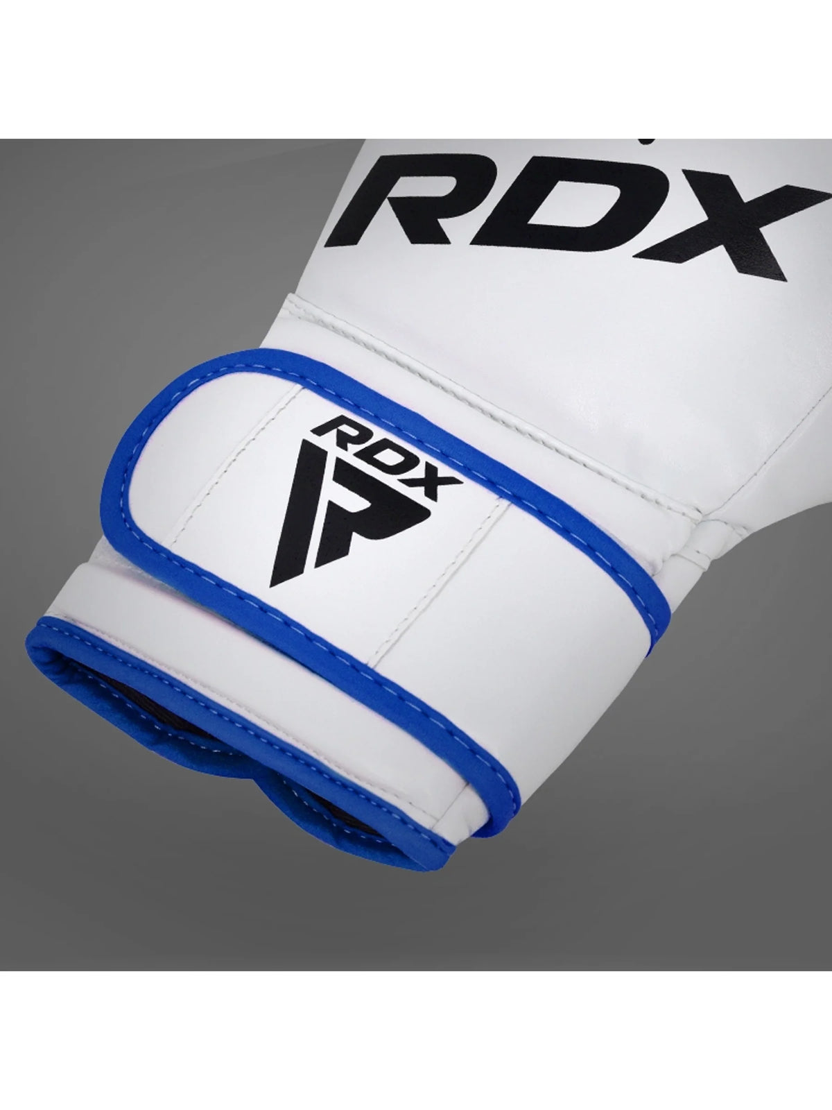 RDX F7 Ego Boxing Glove, blue, knuckle and wrist strap close-up
