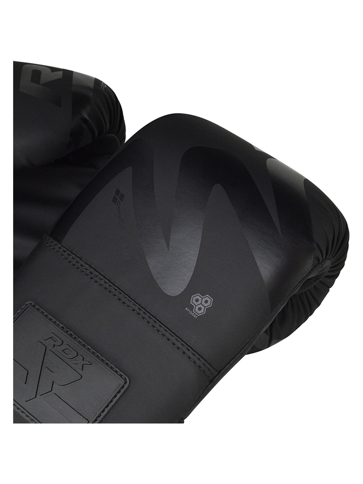RDX F15 Noir Bag Gloves 4oz, black, close-up of padded knuckle panel and RDX logo